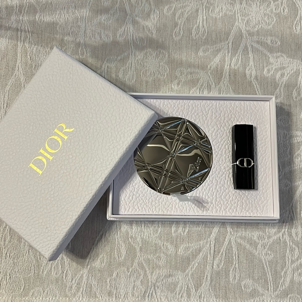Christian Dior pocket mirror and mini lipstick .